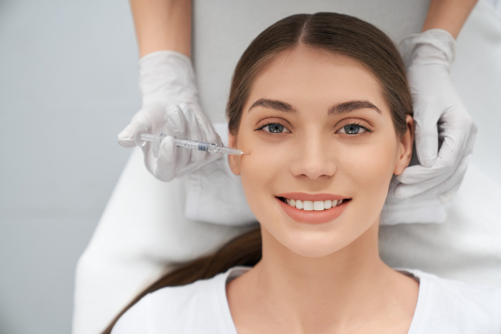 Close-up of a woman receiving a facial injection.